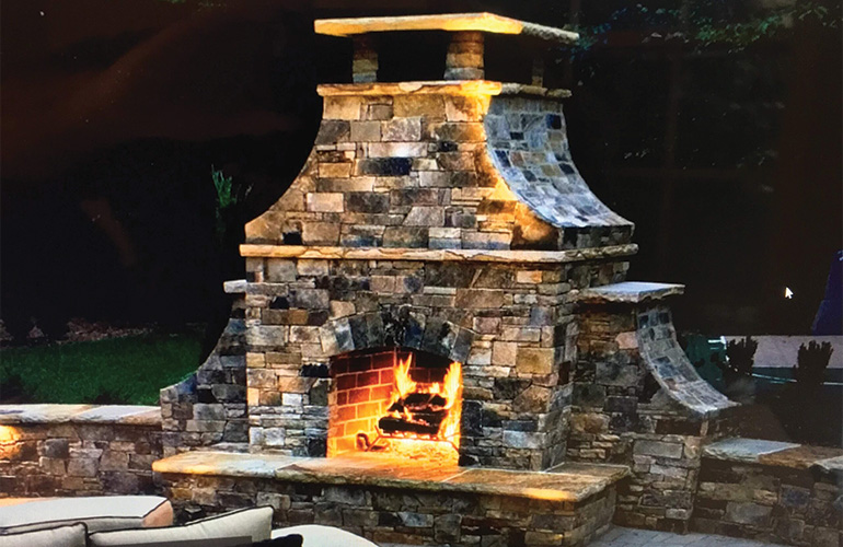 backyard fireplace from CKC Landscaping