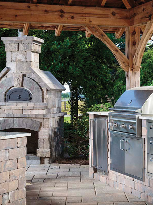 covered patio with outdoor kitchen from CKC Landscaping