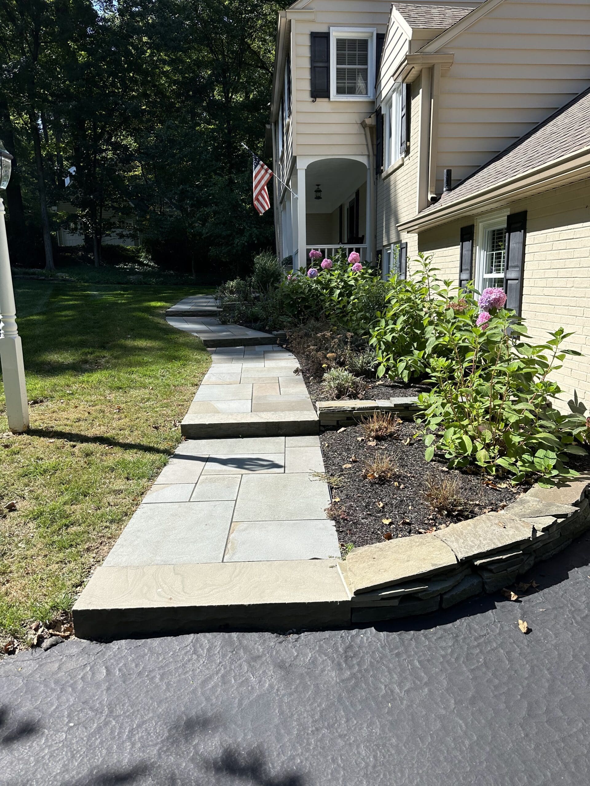 Paver pathway from driveway to the front door from CKC landscaping